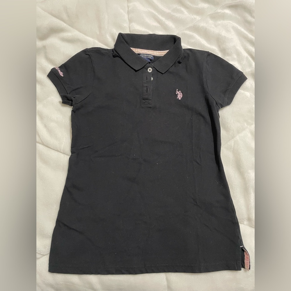 Black collared shirt with pink polo logo